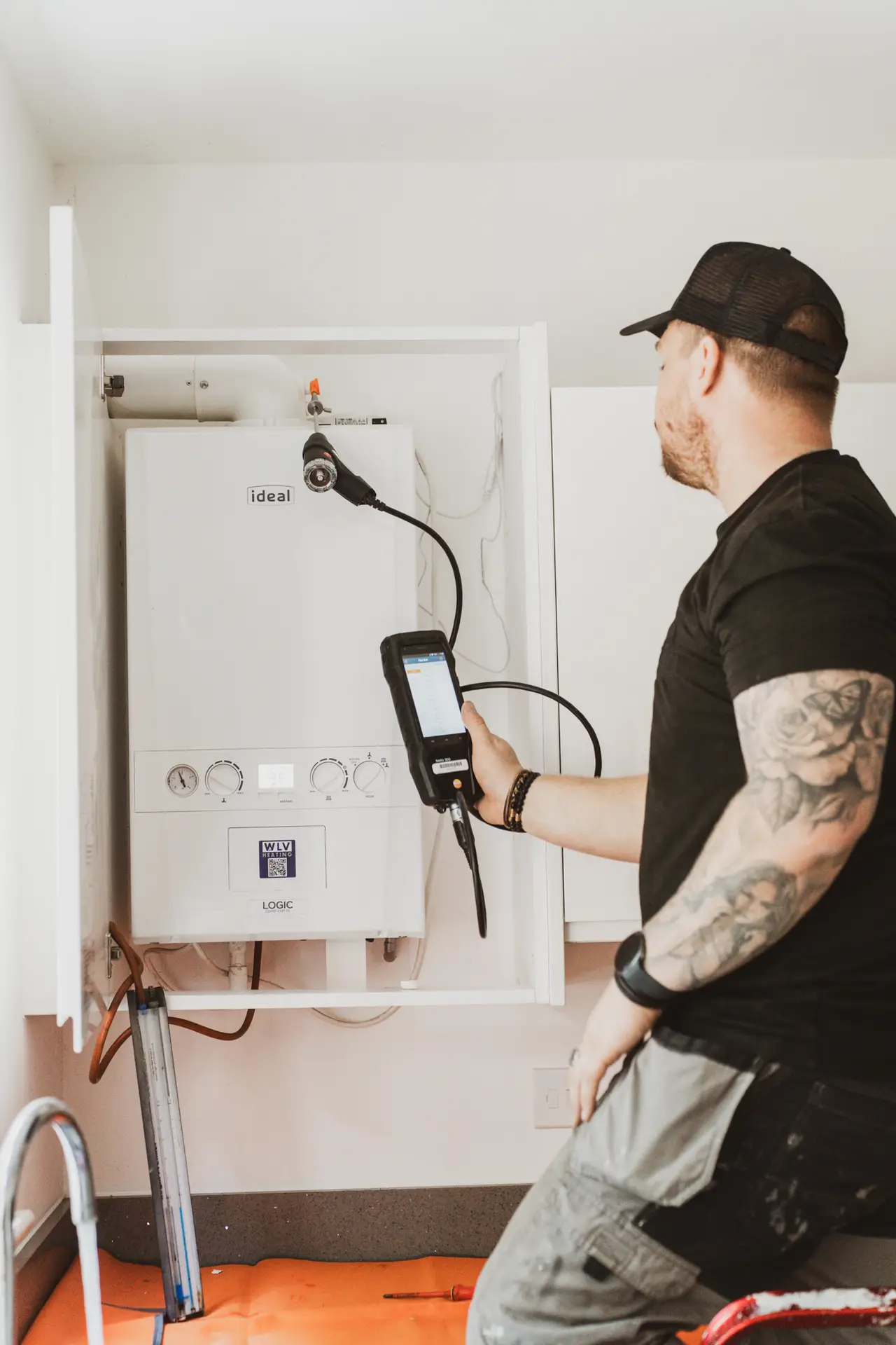 WLV Gas safe engineer carrying our boiler service in the West Midlands